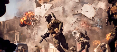 Battlefield 6 Open Beta, etualalla sotilas juoksee pois päin räjähdysten vuoksi sortuvaa rakennusta