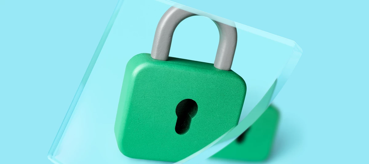 Security - a lock before a magnifying glass